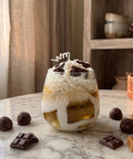More espresso with whipped cream and chocolate